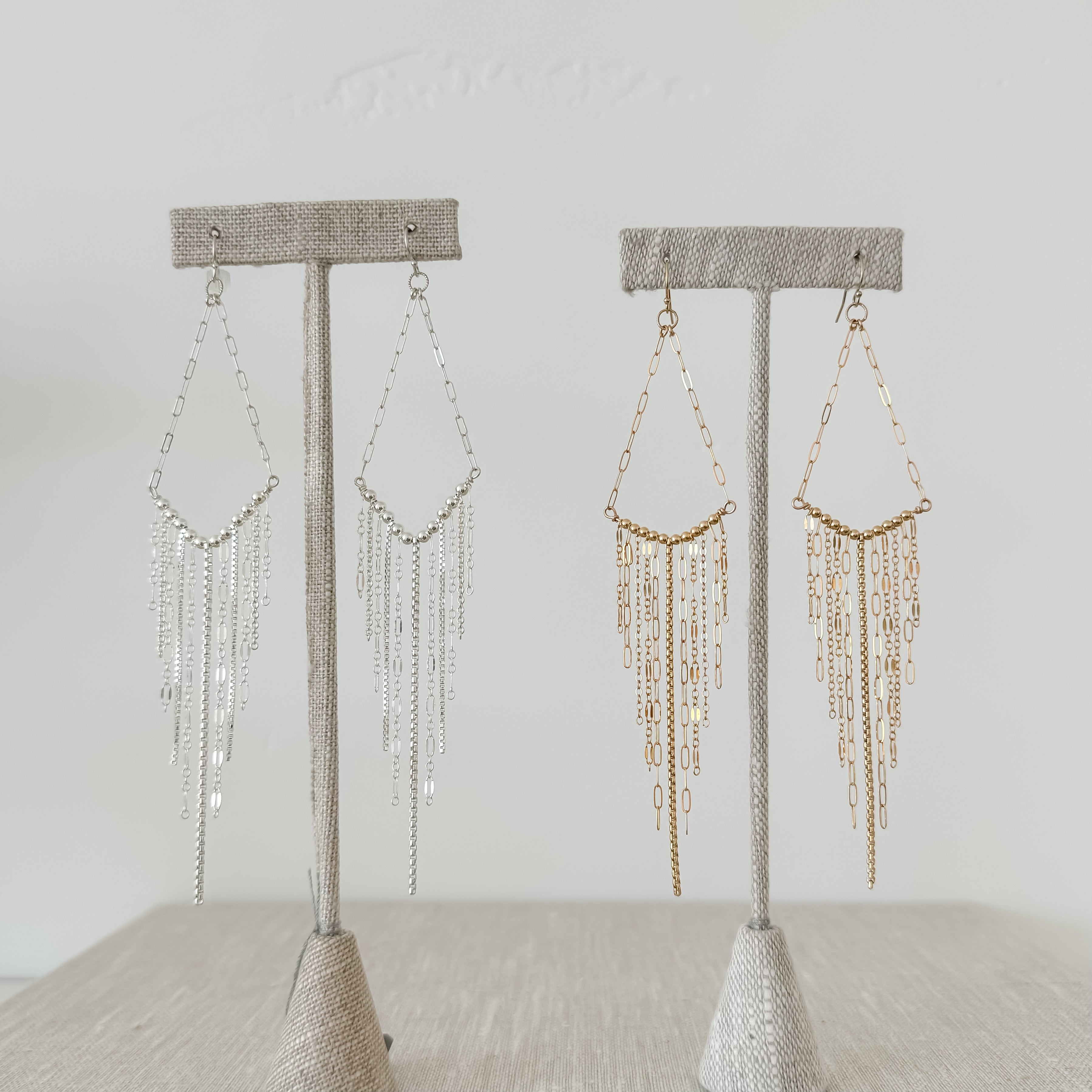 V fringe earrings